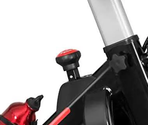 Red resistance knob with push-to-stop emergency brake